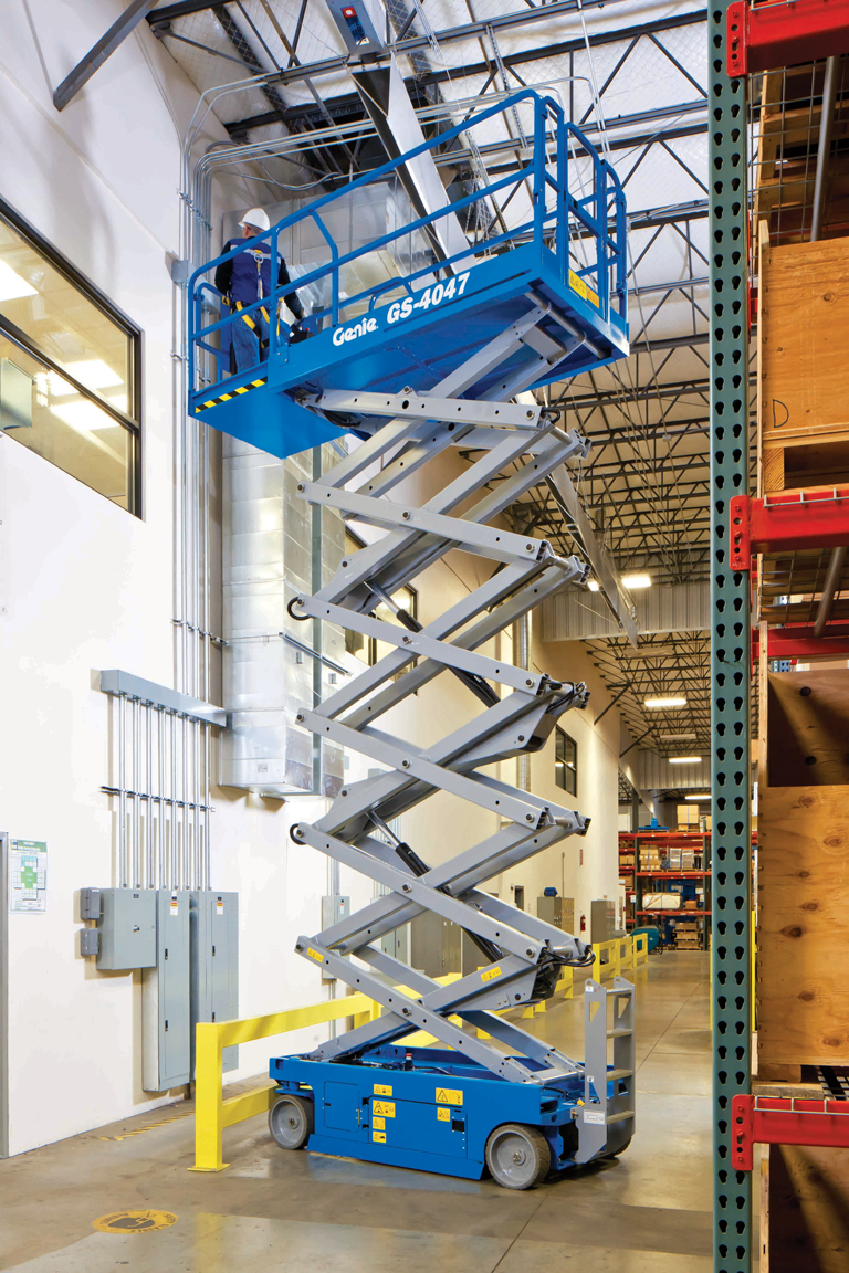 Genie scissor lift GS4047 working in a warehouse