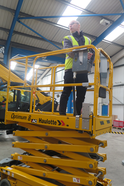 HLS very own Stuart on the Haulotte Optimum 8 electric scissor lift